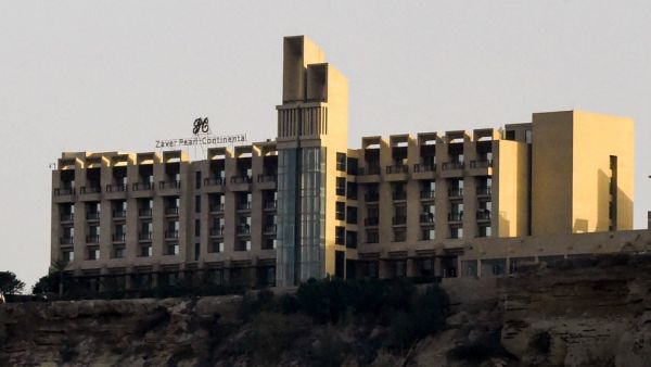 At least one person has been killed after three gunmen stormed a five-star hotel in the southwestern Pakistani city of Gwadar, the centrepiece of a multi-billion dollar Chinese infrastructure project, the military said on May 11. (BANARAS KHAN / AFP)