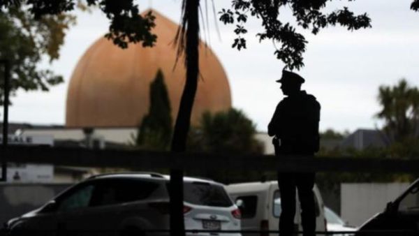An armed policeman stands guard in front of the Masjid Al Noor Mosque in Christchurch. (AFP/ File Photo)