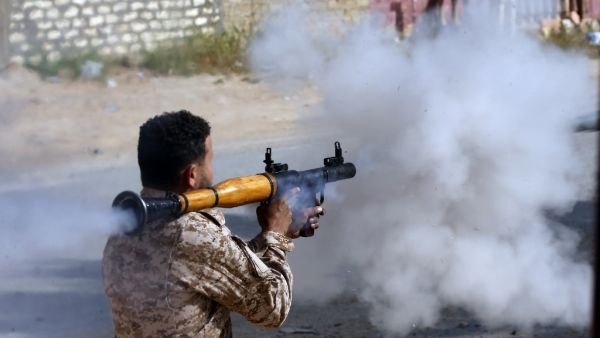A Libyan fighter loyal to the Government of National Accord (GNA) fires a rocket propelled grenade during clashes with forces loyal to strongman Khalifa Haftar south of the capital Tripoli's suburb of Ain Zara, on April 20, 2019. (AFP)