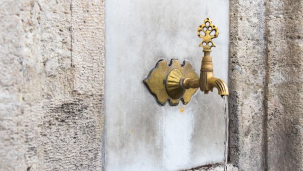 Turkish Ottoman style water tap at the ablution fountain in the courtyard of Fatih mosque. (Shutterstock/ File Photo)