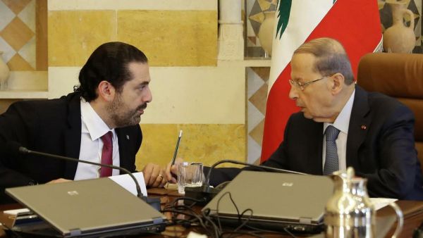 Lebanese President Michel Aoun, right, and Prime Minister-designate Saad Hariri at the presidential palace. (AFP /File Photo)