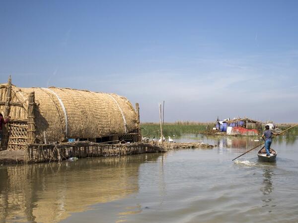 This picture taken on March 29, 2019 shows a floating palm reed-woven house for tourists in the marshes of the southern Iraqi district of Chibayish in Dhi Qar province, about 120 kilometres northwest of the southern city of Basra. Hussein FALEH / AFP
