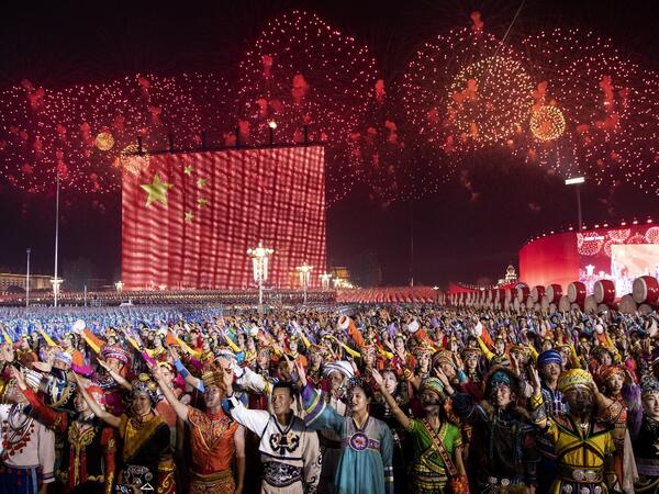 Chinese participants take part in a gala in Tiananmen Square in Beijing on October 1, 2019, to mark the 70th anniversary of the founding of the People’s Republic of China. NOEL CELIS / AFP
