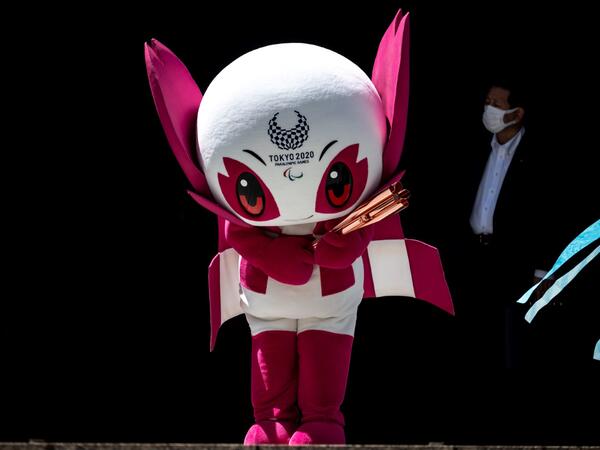 The Tokyo 2020 Paralympic mascot Someity performs during a "flame gathering event" for the Tokyo 2020 Paralympic Torch Relay at the Metropolitan Government Building in Tokyo on August 20, 2021, ahead of the start of the Paralympic Games on August 24.
