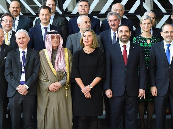 (From bottom left) UN Special Envoy for Syria Staffan de Mistura, UN Under-Secretary General for Humanitarian and Affairs and Emergency Relief Coordinator Mark Lowcock, Saudi Arabia Foreign Minister Adel Al-Jubeir, EU Foreign policy chief Federica Mogherini, Lebanon's PM Saad Hariri, and Jordan's FM Ayman al-Safadi pose for a photo during a conference on "Supporting Future of Syria and the Region" at the European Council in Brussels on April 25, 2018. Emmanuel Dunand /AFP
