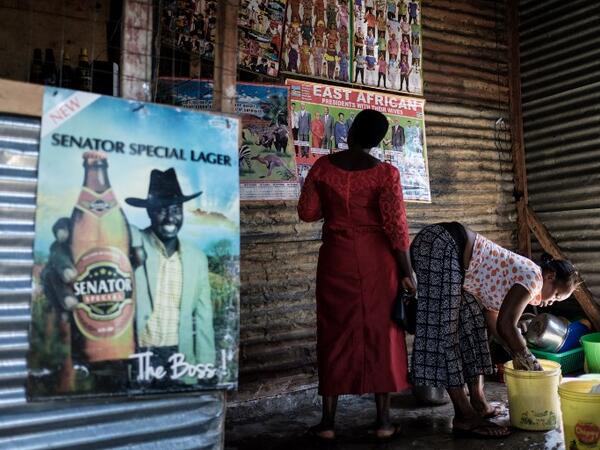 A woman cleans her bar on Migingo island on October 5, 2018 which is densely populated by residents fishing mainly for Nile perch in Lake Victoria on the border of Uganda and Kenya.
Yasuyoshi CHIBA / AFP