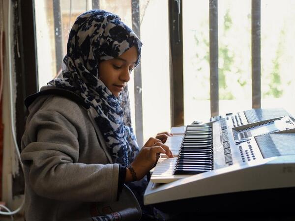 Children attend a music class at the Al-Nawras school in Taez, Yemen's third city, in the country's southwest
AHMAD AL-BASHA / AFP