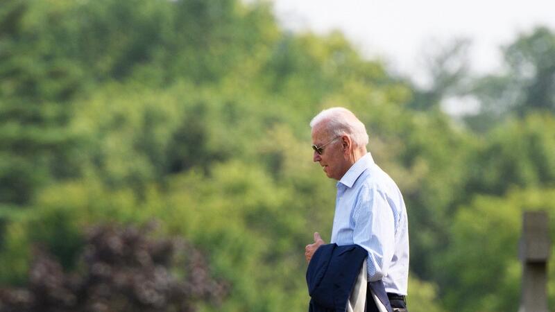 US President Joe Biden returns to his car after attending service at Saint Joseph on the Brandywine Roman Catholic Church in Wilmington, Delaware on July 24, 2021. MANDEL NGAN / AFP Uighur Community wants Biden to recognize East Turkistan