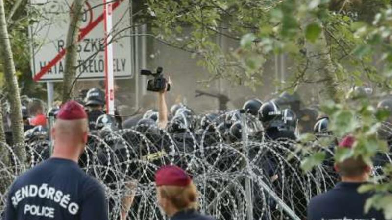 Hungarian border police apparently made the scarecrows (AFP/Sandor Gemesi)