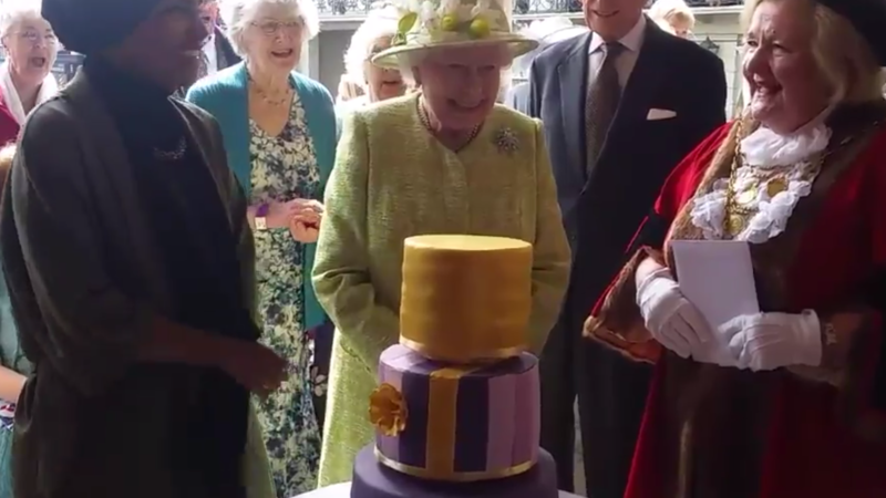 Queen Elizabeth Grins As She Slices Through Her Birthday Cake Made By Nadiya Hussain Al Bawaba @nadiyahussainofficial for more books, tv and homewares info bit.ly/nadiyabakes. queen elizabeth grins as she slices