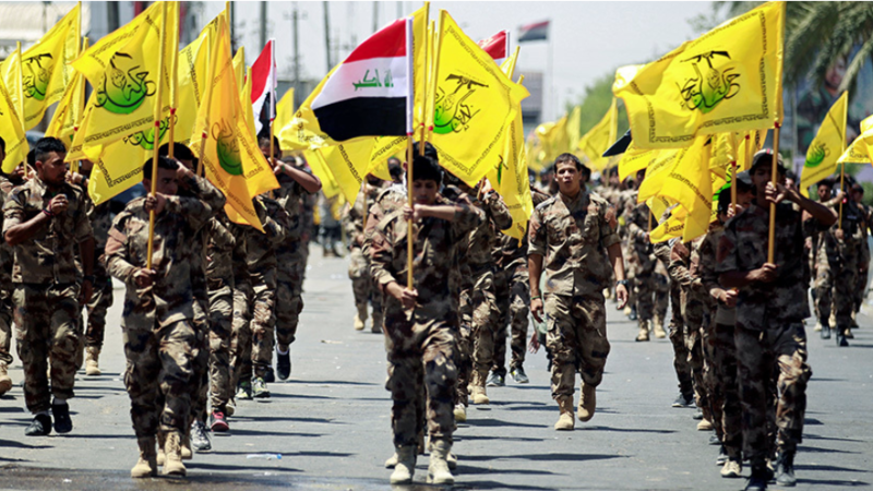 Iraqi Shiite Muslims from the Popular Mobilization Units march during a parade marking the annual Quds Day , Baghdad June 2017 /AFP 