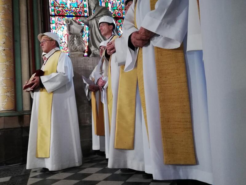 The Notre-Dame de Paris cathedral's rector Patrick Chauvet, attends the first mass in a side chapel two months to the day after a devastating fire engulfed the Notre-Dame de Paris cathedral on June 15, 2019, in Paris.Karine PERRET / POOL / AFP