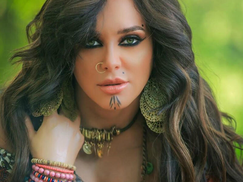 In her latest photos Fawakherji appeared in bright colored clothes and wavy hair Source sulaffawakherji Instagram