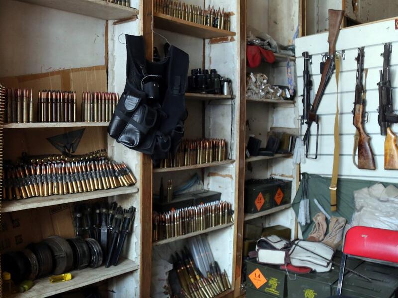 A picture shows a partial view of a weapons shop in Yemen's third city of Taez, on July 13, 2019. Before the war, the old market of Taez was crowded with people and full of handcrafts and artisanal goods. AHMAD AL-BASHA / AFP