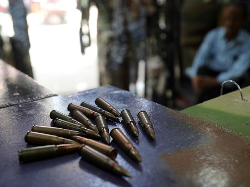 Bullets are on display at a shop in Yemen's third city of Taez, on July 13, 2019. Before the war, the old market of Taez crowded with people and was full of handcrafts and artisanal goods. Today, more than four years after the Huthi rebels began their siege on Yemen's third largest city, bullets and guns have taken over the market. AHMAD AL-BASHA / AFP