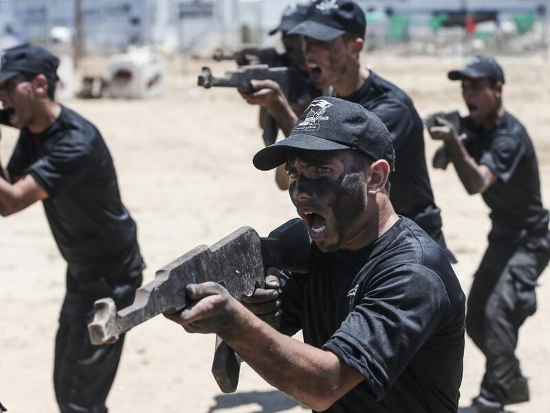 Palestinian military cadets take part in a training session organised by Hamas' military wing, the Ezzedin al-Qassam Brigades, in Gaza City on July 20, 2019.  MAHMUD HAMS / AFP