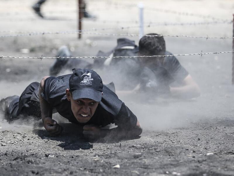 Palestinian military cadets take part in a training session organised by Hamas' military wing, the Ezzedin al-Qassam Brigades, in Gaza City on July 20, 2019.  MAHMUD HAMS / AFP