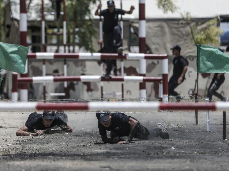 Palestinian military cadets take part in a training session organised by Hamas' military wing, the Ezzedin al-Qassam Brigades, in Gaza City on July 20, 2019.  MAHMUD HAMS / AFP