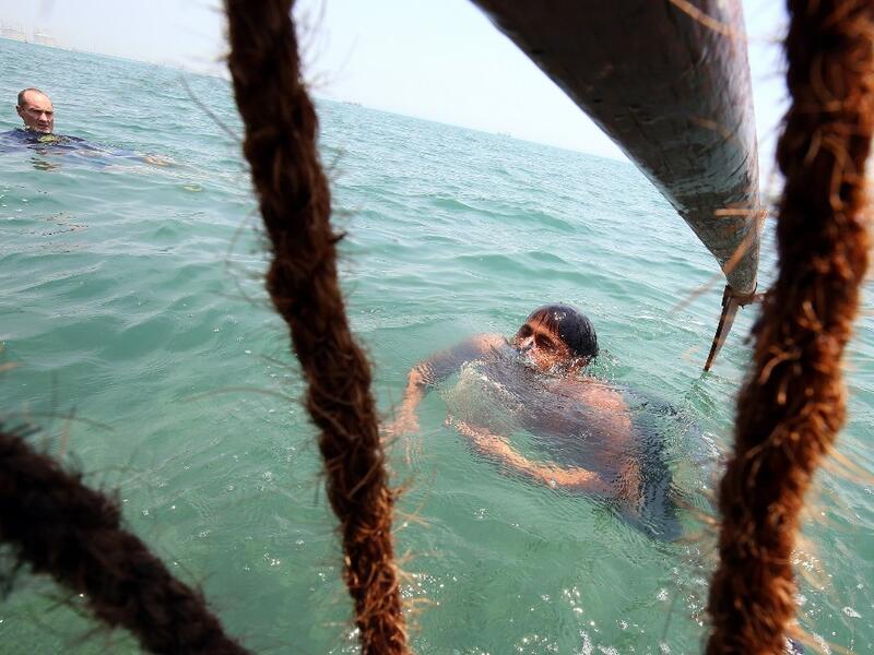 Pearl-diving trips are held annually under the patronage of the Kuwaiti emir in order to keep alive traditions that accompanied the once important national trade of pearl diving, prior to the discovery of oil. Yasser Al-Zayyat / AFP