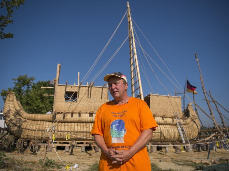 Abora IV expedition leader German archeologist Dominique Goerlitz speaks to AFP in front of the 14-meter long sailing reed boat in the town of Beloslav, Bulgaria, on July 25, 2019. NIKOLAY DOYCHINOV / AFP