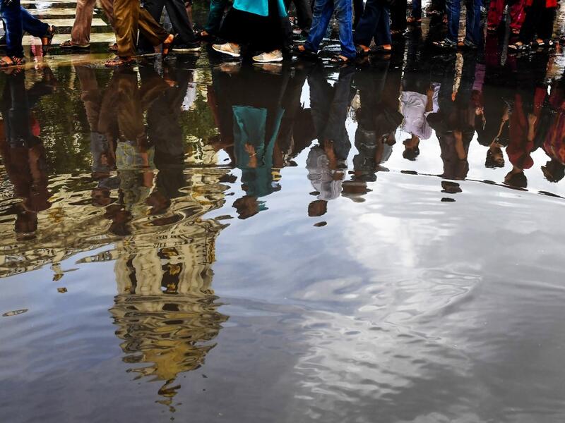 Protestors and social activists take part in a protest in Kolkata on August 6, 2019, in reaction to the Indian government scrapping Article 370 that granted a special status to Jammu and Kashmir.  Dibyangshu SARKAR / AFP