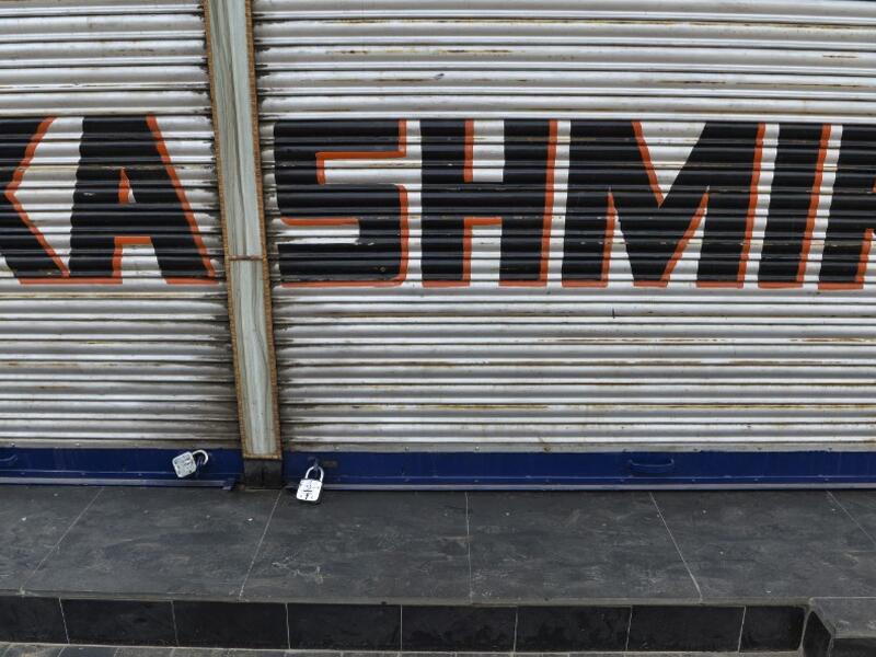 A closed shop is pictured during curfew in Srinagar Sajjad HUSSAIN / AFP