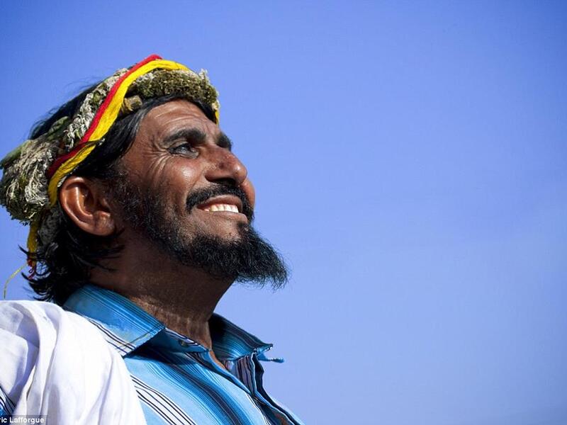Garlands made exclusively for medicinal purposes, such as the one this man is wearing, are less pretty and stuffed with herbs (Facebook)