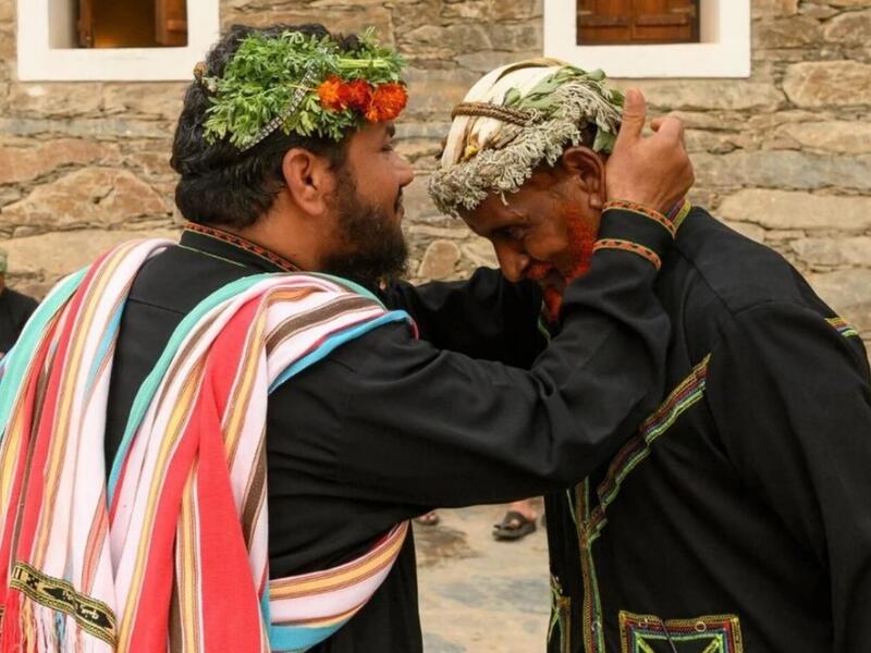 The men wear ornate garlands made from herbs and flowers growing wild in the foothills of the mountains (vice.com)