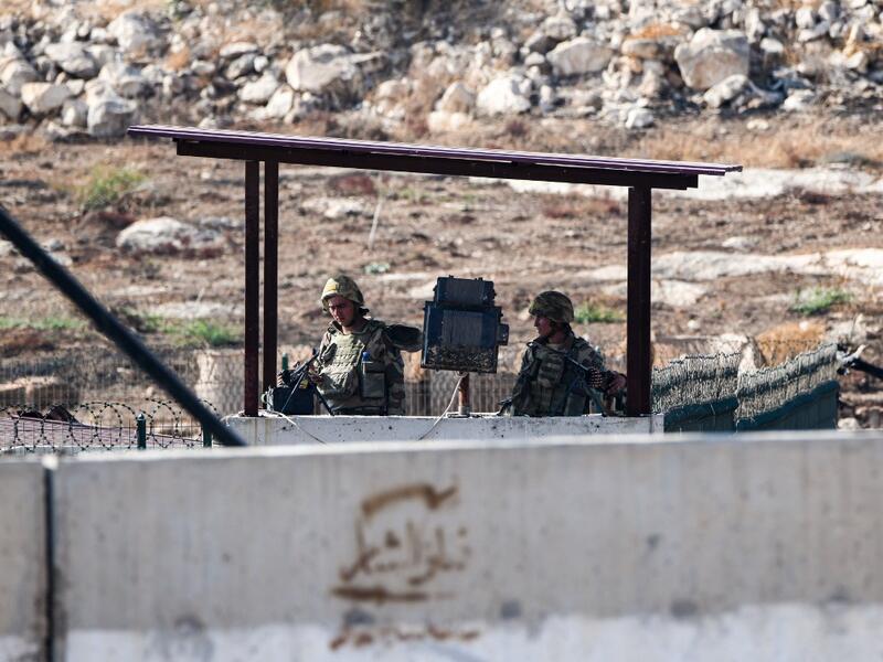 Members of the Turkish gendarmerie man an outpost along the border with Syria near the Syrian town of Atme in the northwestern Idlib province  (AFP)
