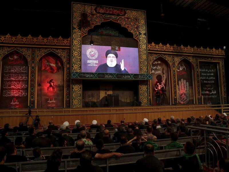Nasrallah said today his movement's response to a recent drone attack on the group's Beirut stronghold had been "decided", adding that Israel "must pay a price" for the assault. (AFP/ File Photo)