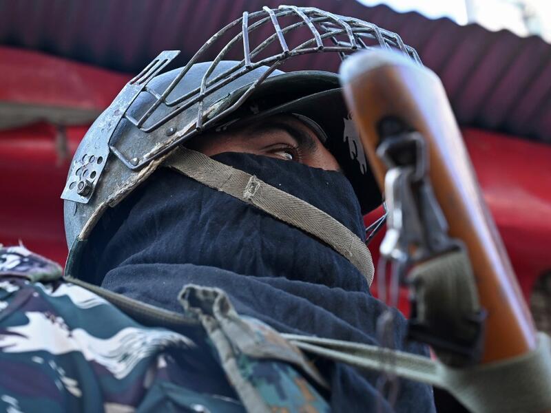 An Indian paramilitary trooper stands guard during heavy restrictions on movements in Srinagar  (AFP)