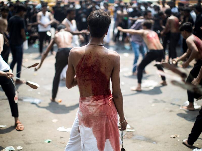 Shiite Muslim mourners flagellate themselves during a procession on the tenth day of Muharram which marks the day of Ashura, in New Delhi on September 10, 2019. (AFP/ File Photo)