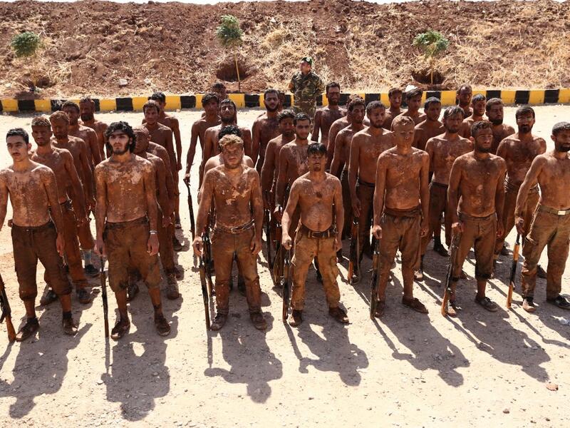 Turkish-backed fighters from al-Mutasim Brigade take part in a training at a camp near the Syrian town of Marea in the northern Aleppo district, on September 12, 2019. Nazeer Al-khatib / AFP