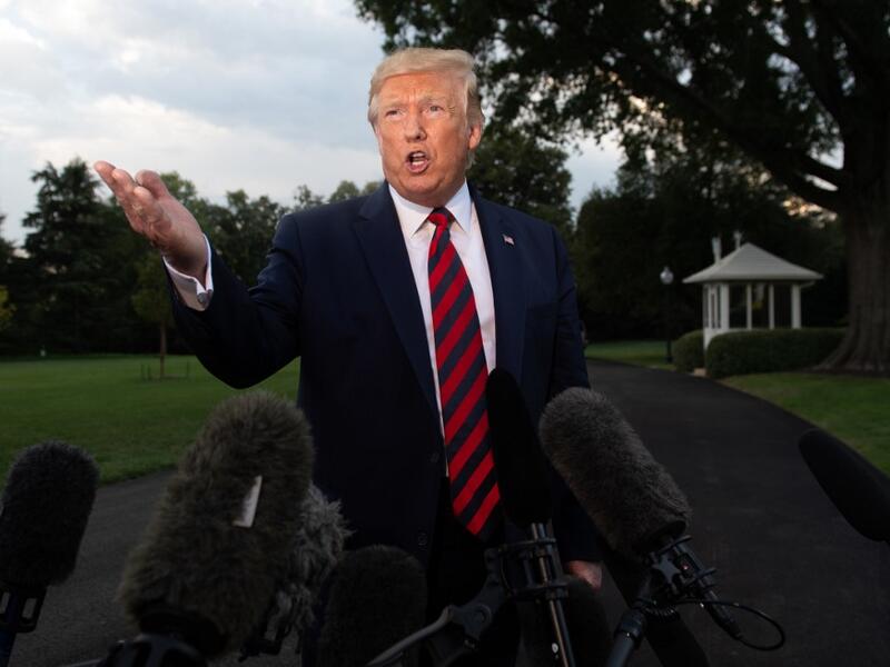 US President Donald Trump gestures as he speaks to the media prior to departing on Marine One from the South Lawn of the White House in Washington, DC, September 12, 2019. (AFP/ File Photo)