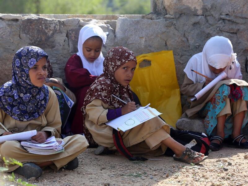 Yemeni school children attend an open-air class at their unfinished school in the southwestern Yemen Ahmad AL-BASHA / AFP