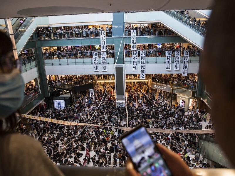 Pro-democracy protesters gather during a protest inside the New Town Plaza shopping mall in Hong Kong's Sha Tin district on September 22, 2019. (AFP/ File Photo)