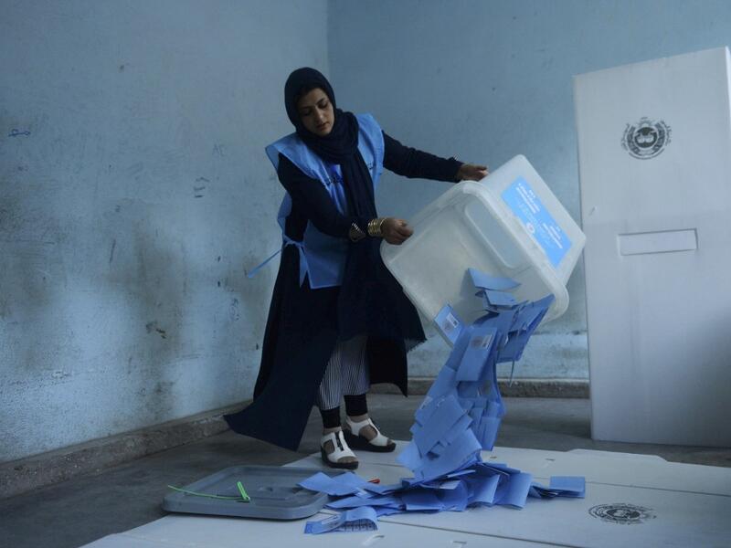 An Afghan Independent Election Commission (IEC) official empties a ballot box to count ballot papers after polling stations closed, in Herat on September 28, 2019. (AFP/ File Photo)