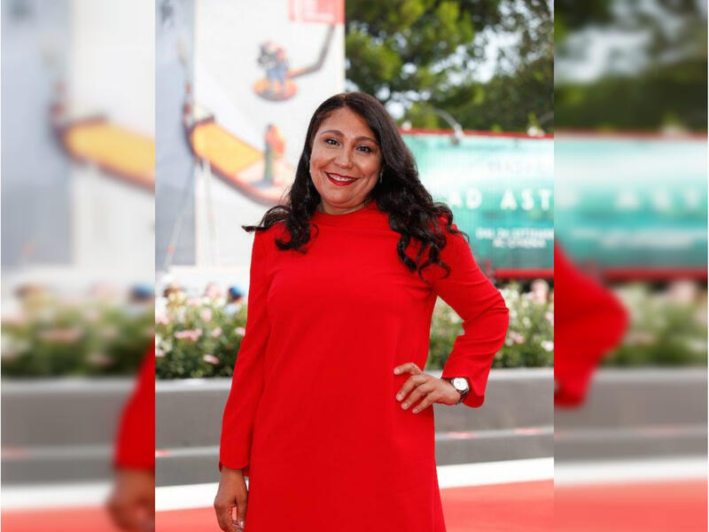 Saudi director Haifa Al Mansour wore a red dress by Jaeger-LeCoultre
