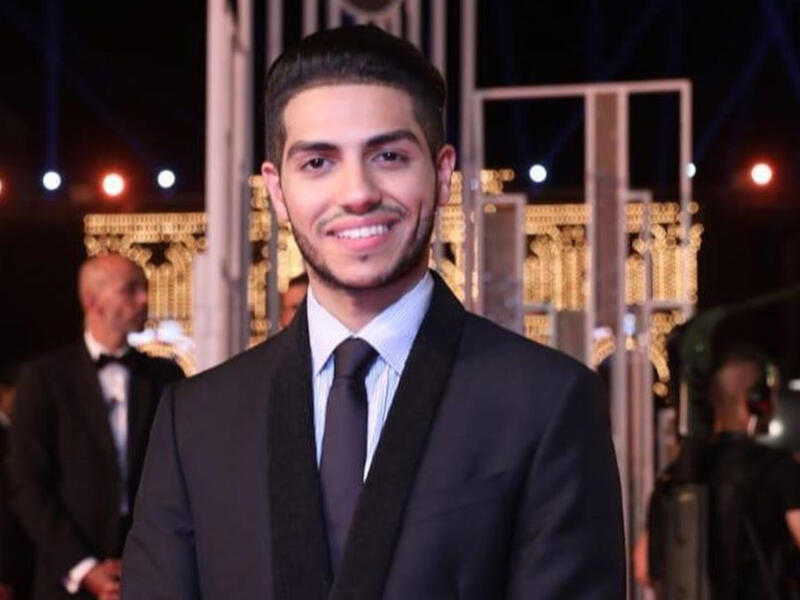 Mena appeared sitting amid the band playing and singing Source menamassoud Instagram