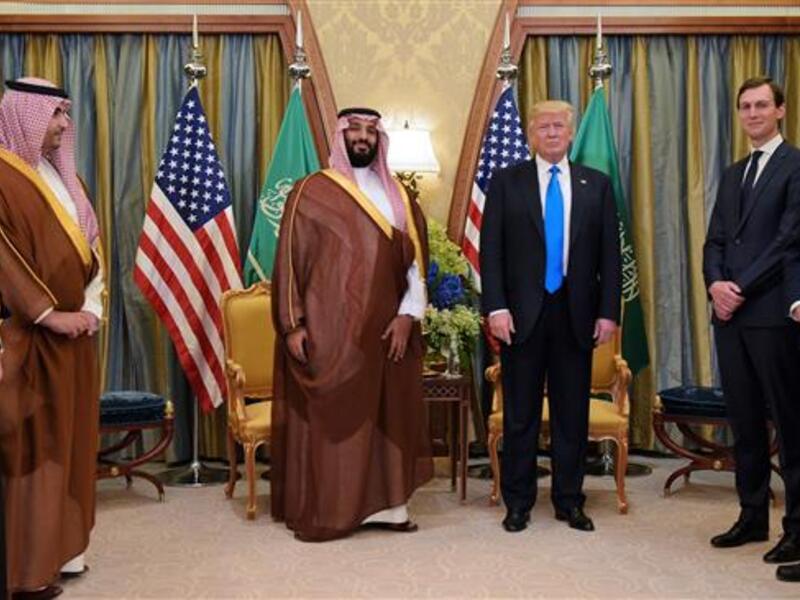  US President Donald Trump (C-R) and Saudi Deputy Crown Prince Mohammad bin Salman Al Saud take part in a bilateral meeting at a hotel in Riyadh. (AFP)