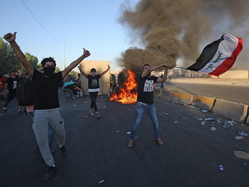 Iraqi protesters take part in a demonstration against state corruption, failing public services, and unemployment, in the Iraqi capital Baghdad's central Khellani Square on October 4, 2019. (AFP/ File Photo)