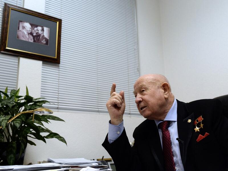 Soviet cosmonaut Alexei Leonov, who was the first man to walk in space on March 18, 1965, gestures during his interview with AFP in Moscow. The first to conduct a spacewalk, Soviet-era cosmonaut Alexei Leonov, has died in Moscow aged 85, his assistant said.  Vasily MAXIMOV / AFP