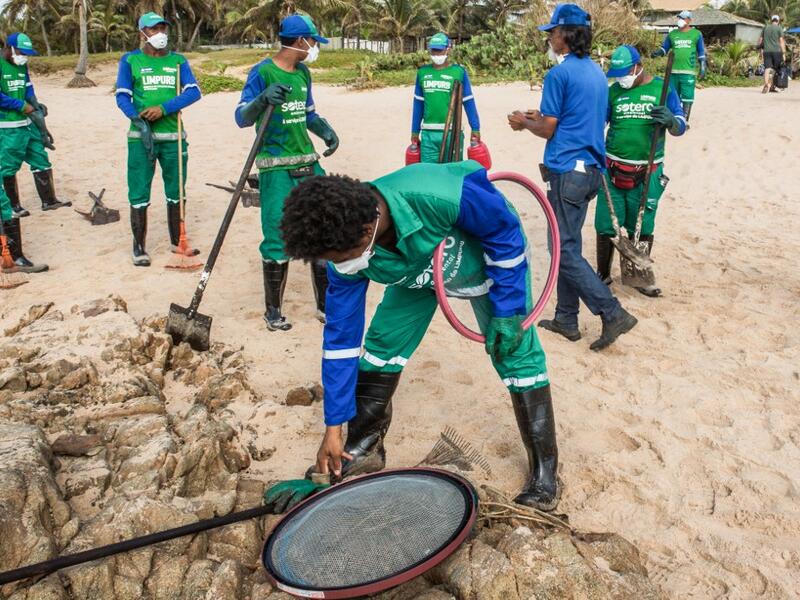 Large blobs of oil staining more than 130 beaches in northeastern Brazil began appearing in early September and have now turned up along a 2,000km stretch of the Atlantic coastline. The source of the patches remain a mystery despite President Jair Bolsonaro's assertions they came from outside the country and were possibly the work of criminals. ANTONELLO VENERI / AFP
