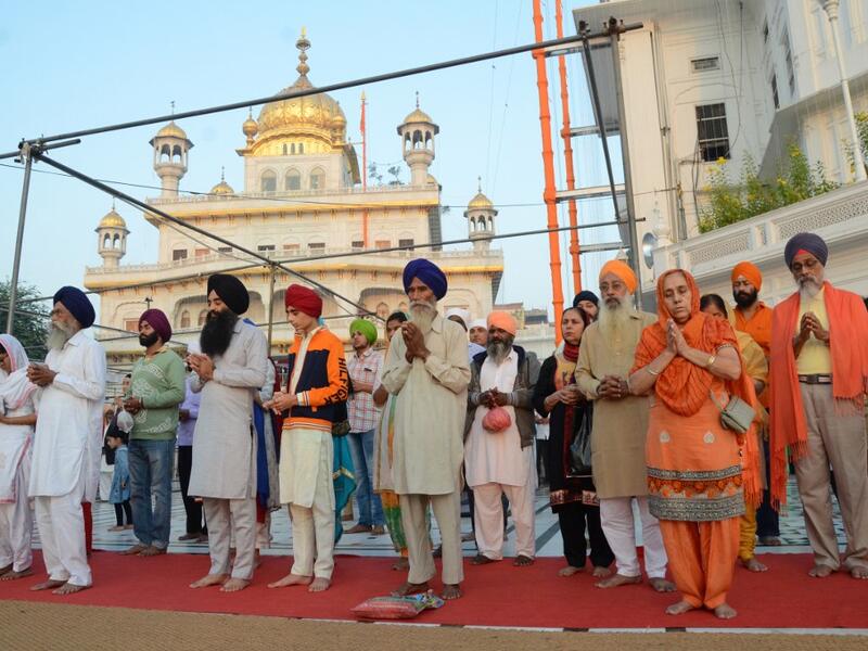 Sikh devotees visit the Golden Temple to mark Bandi Chhor Divas which coincides with the day of Diwali in Amritsar on October 27, 2019. Sikhs celebrate Bandi Chhor Divas on the same day as the Hindu festival of Diwali, to mark the historic return of the sixth Guru Hargobind. NARINDER NANU / AFP