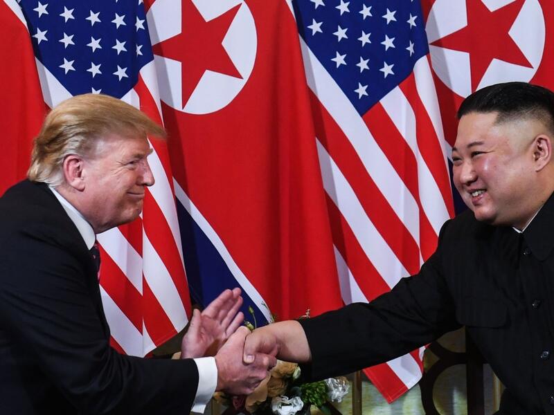 US President Donald Trump shakes hands with North Korean leader Kim Jong-un following a meeting in Hanoi, Vietnam, in February. (AFP/ File Photo)