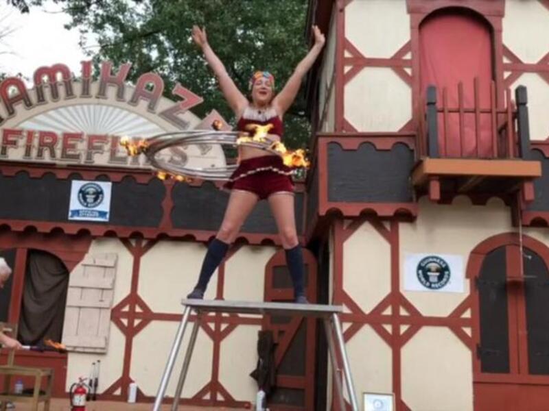 Casey Martin broke a Guinness World Record by spinning five flaming hula hoops. (Twitter)