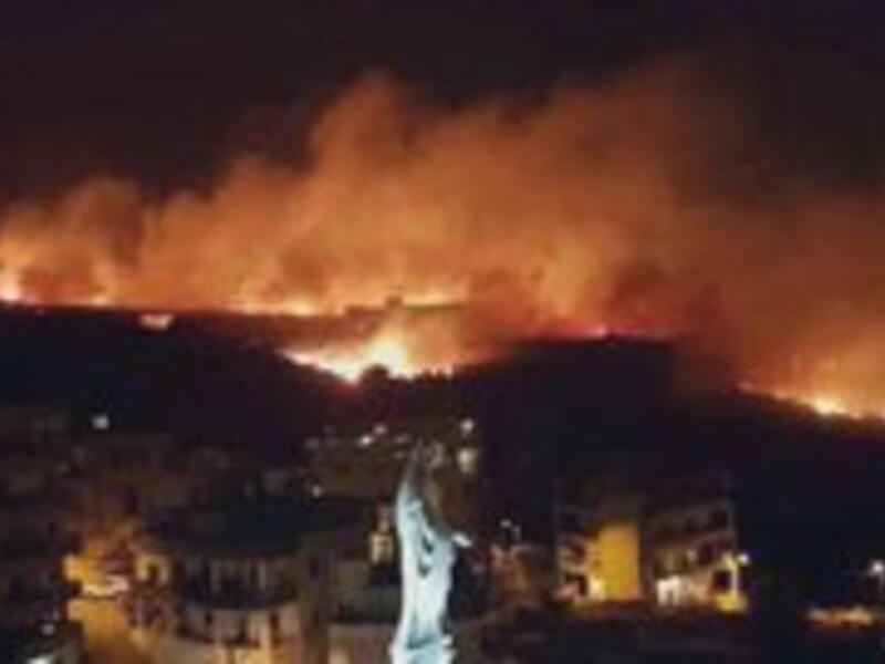 At least one Lebanese Army helicopter was seen working to fight the blaze. (Twitter)
