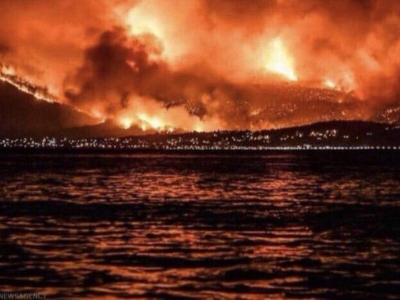 At least one Lebanese Army helicopter was seen working to fight the blaze. (Twitter)