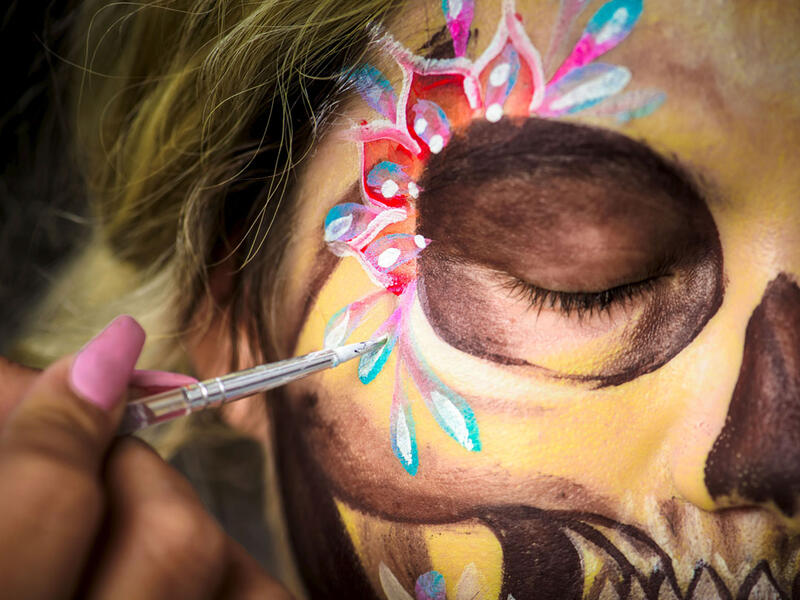Ingrid Lopez is made up as Catrina by the artist Ixchel Garcia during a costume and makeup rehearsal for the Mega-Procession of the Catrinas in Mexico City. Omar Torres / AFP / Getty