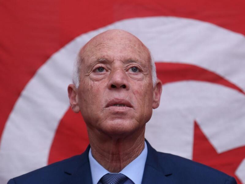 Tunisian presidential candidate Kais Saied speaks in Tunis on 17 September (AFP)
